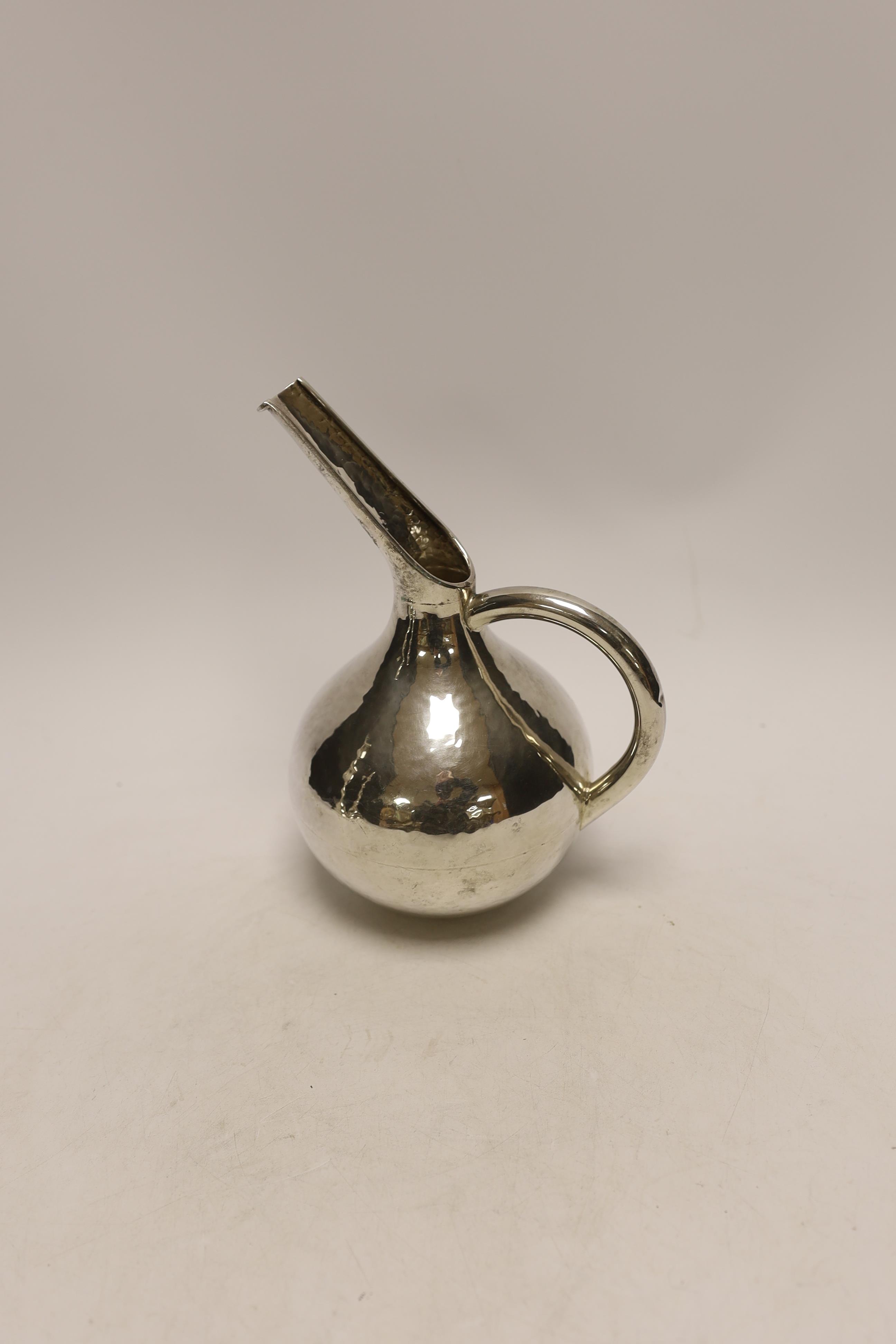 A Cypriot 925 milk pitcher, with elongated spout, height 20.3cm, 8.9oz.